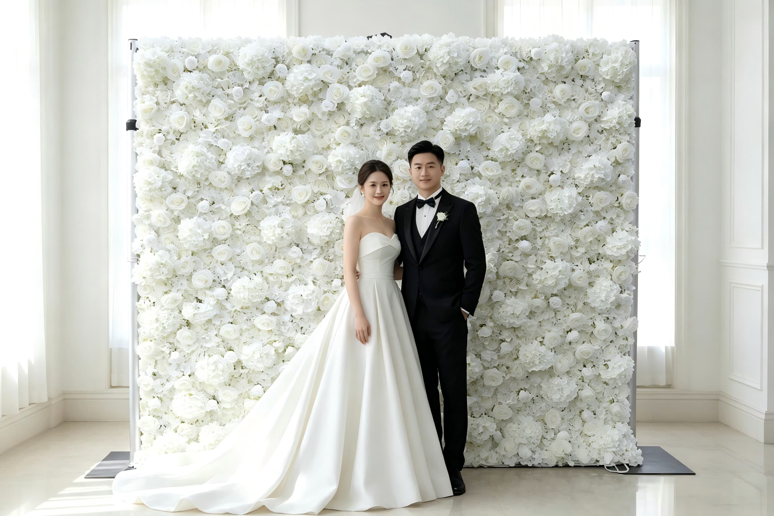 white floral backdrop wedding photography bride and groom