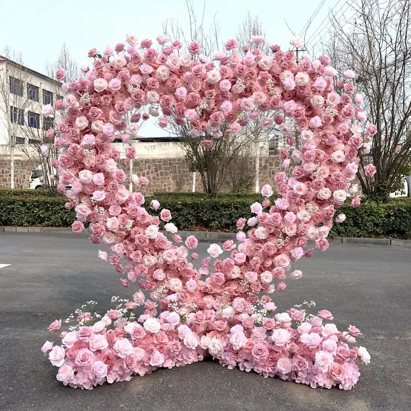 pink heart flower arch wedding